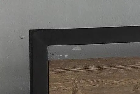Wood Panel Bed with a Black Steel Frame